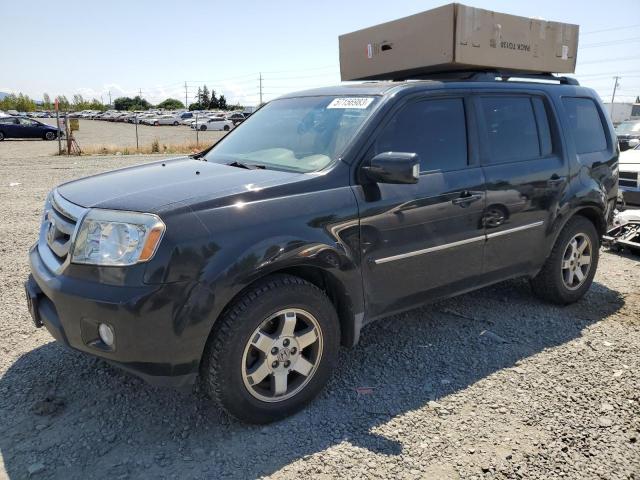 HONDA PILOT TOUR 2010 with VIN 5FNYF4H99AB004627 - Photo from auction