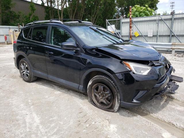 Photo 4 from auction – 2017 TOYOTA RAV4 LE with VIN 2T3BFREV2HW579385