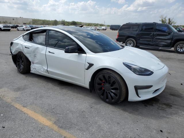 Photo 4 from auction – 2021 TESLA MODEL 3 with VIN 5YJ3E1EC7MF085790