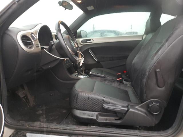 Photo 7 from auction – 2013 VOLKSWAGEN BEETLE with VIN 3VWJX7AT1DM636458