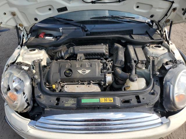 Photo 11 from auction – 2009 MINI COOPER with VIN WMWMF335X9TW78031