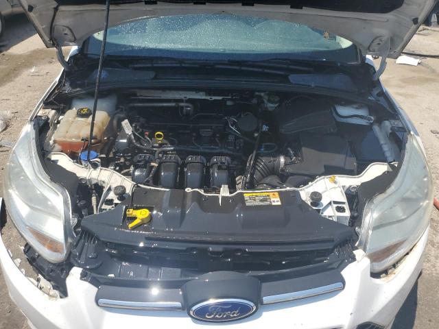 Photo 11 from auction – 2014 FORD FOCUS S with VIN 1FADP3E20EL119512