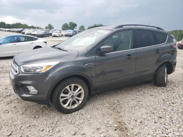 FORD ESCAPE SE 2018 with VIN 1FMCU9G99JUB49152 - Photo from auction