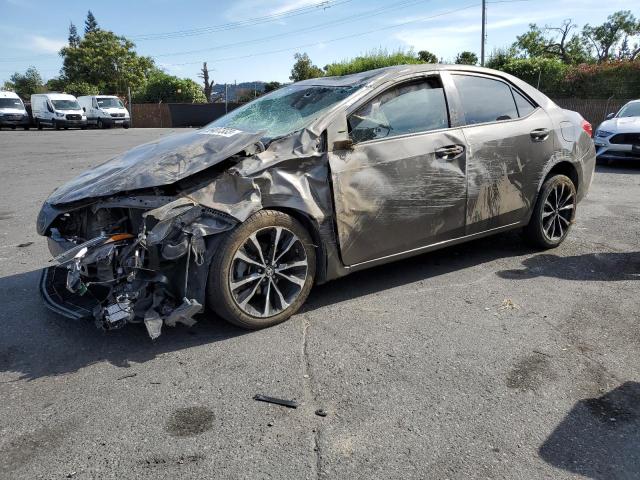 TOYOTA COROLLA L 2018 with VIN 5YFBURHE2JP791009 - Photo from auction