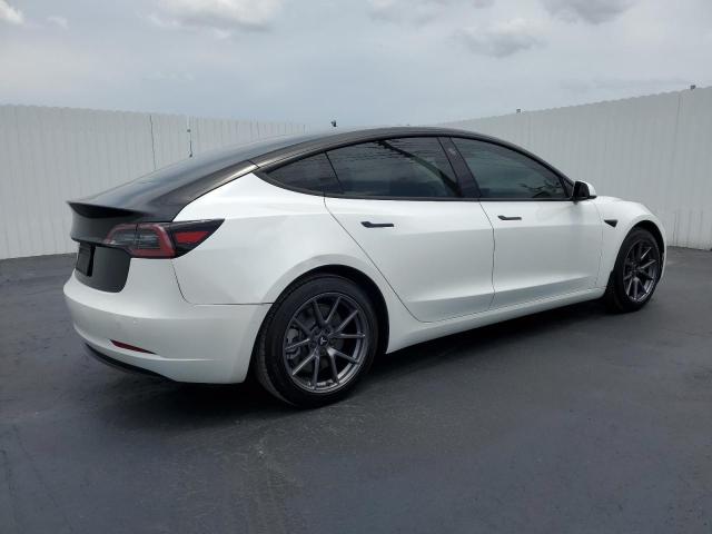 Photo 3 from auction – 2021 TESLA MODEL 3 with VIN 5YJ3E1EA5MF058411