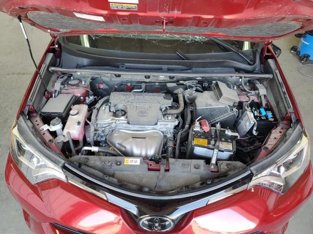 Photo 12 from auction – 2018 TOYOTA RAV4 LE with VIN JTMBFREV2JD233467