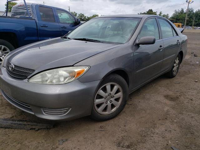 TOYOTA CAMRY LE 2003 with VIN 4T1BF30K03U546526 - Photo from auction