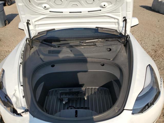 Photo 11 from auction – 2022 TESLA MODEL 3 with VIN 5YJ3E1EB8NF202382