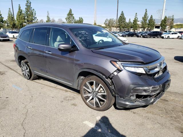 Photo 4 from auction – 2022 HONDA PILOT TOUR with VIN 5FNYF6H95NB016355