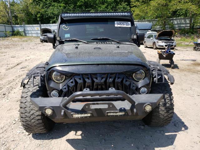 Photo 5 from auction – 2011 JEEP WRANGLER U with VIN 1J4BA5H15BL532579