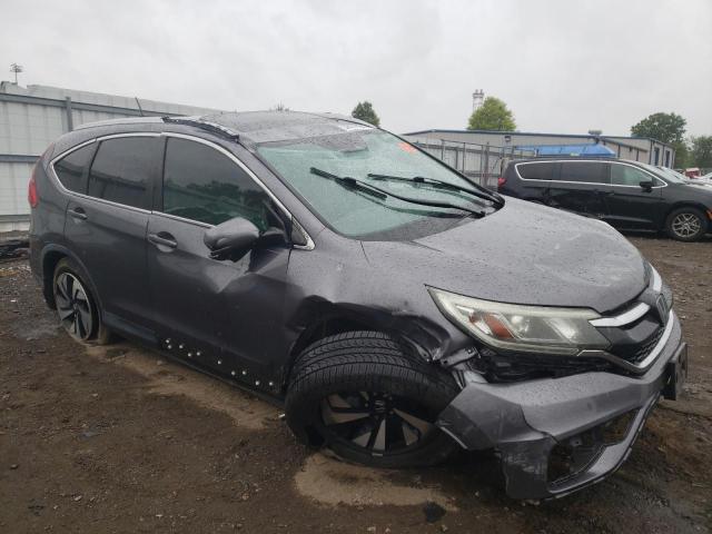 Photo 4 from auction – 2016 HONDA CR-V TOURI with VIN 5J6RM3H94GL001932