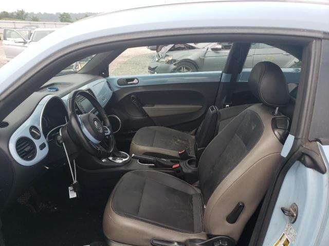 Photo 7 from auction – 2013 VOLKSWAGEN BEETLE with VIN 3VWJX7AT7DM693389