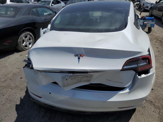 Photo 6 from auction – 2022 TESLA MODEL 3 with VIN 5YJ3E1EB9NF144167