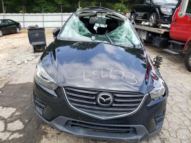 Photo 5 from auction – 2016 MAZDA CX-5 GT with VIN JM3KE2DY9G0656673