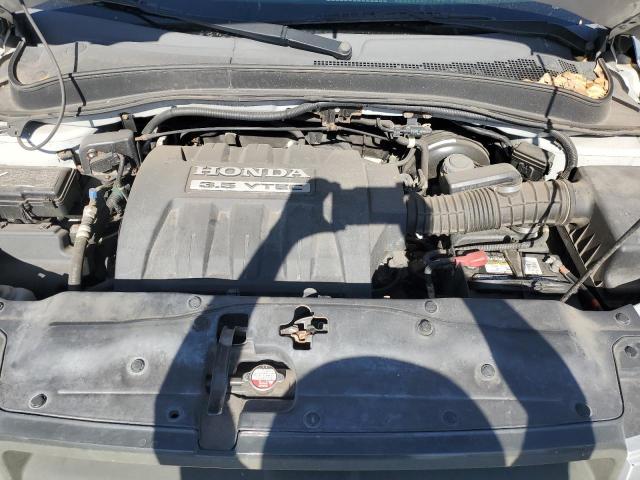 Photo 12 from auction – 2005 HONDA PILOT LX with VIN 2HKYF18145H572977