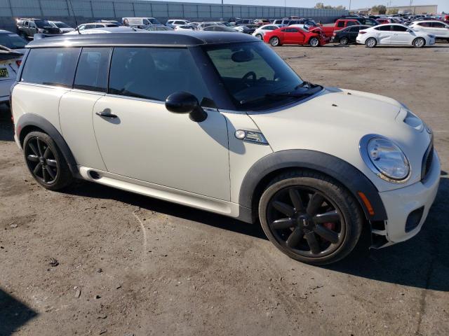 Photo 4 from auction – 2010 MINI COOPER CLU with VIN WMWMM9C51ATL04291