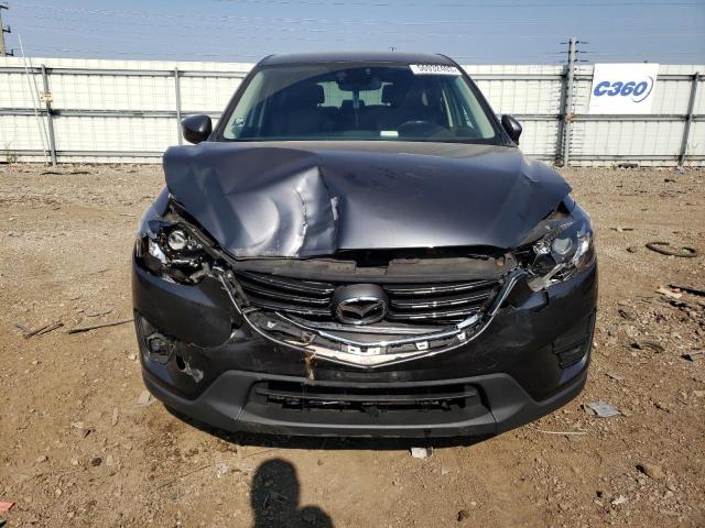 Photo 5 from auction – 2016 MAZDA CX-5 GT with VIN JM3KE4DYXG0796680