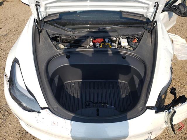 Photo 11 from auction – 2022 TESLA MODEL 3 with VIN 5YJ3E1EB3NF121094