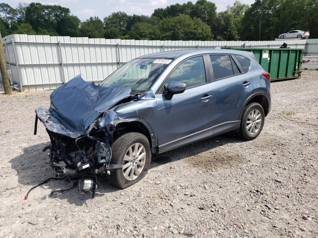 MAZDA CX-5 TOURI 2015 with VIN JM3KE2CY1F0499690 - Photo from auction