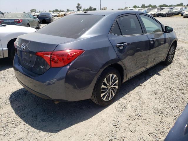 Photo 3 from auction – 2017 TOYOTA COROLLA L with VIN 5YFBURHE2HP660785