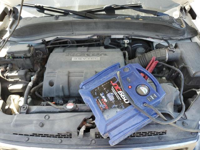 Photo 12 from auction – 2014 HONDA RIDGELINE with VIN 5FPYK1F51EB006234