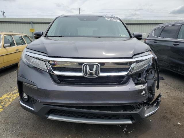 Photo 5 from auction – 2021 HONDA PILOT TOUR with VIN 5FNYF6H96MB034085