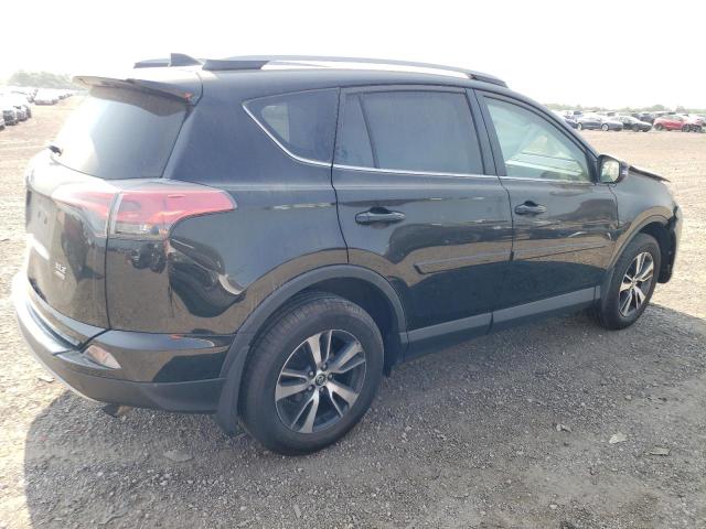 Photo 3 from auction – 2017 TOYOTA RAV4 XLE with VIN 2T3RFREV5HW668656