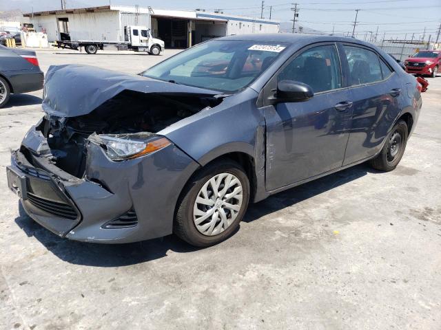 TOYOTA COROLLA L 2017 with VIN 5YFBURHE7HP571438 - Photo from auction