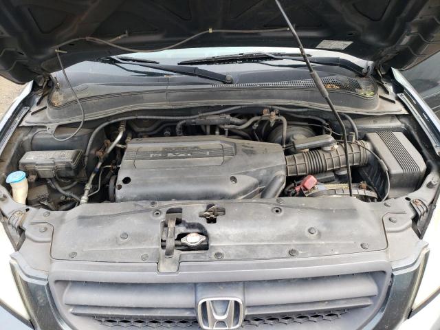 Photo 12 from auction – 2004 HONDA PILOT EXL with VIN 2HKYF18644H536524