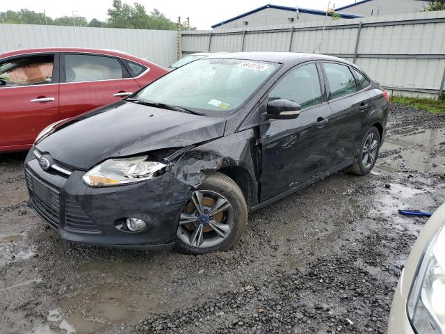 FORD FOCUS SE 2014 with VIN 1FADP3F21EL308698 - Photo from auction