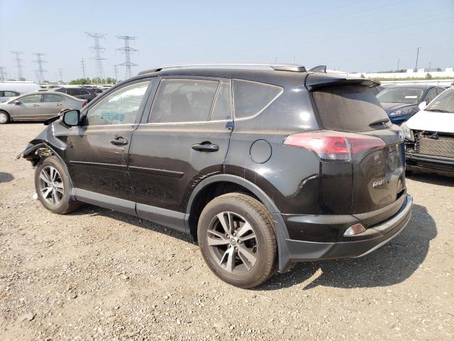 Photo 2 from auction – 2017 TOYOTA RAV4 XLE with VIN 2T3RFREV5HW668656