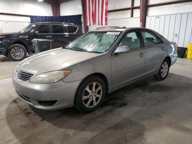 TOYOTA CAMRY LE 2005 with VIN 4T1BF30K25U606762 - Photo from auction