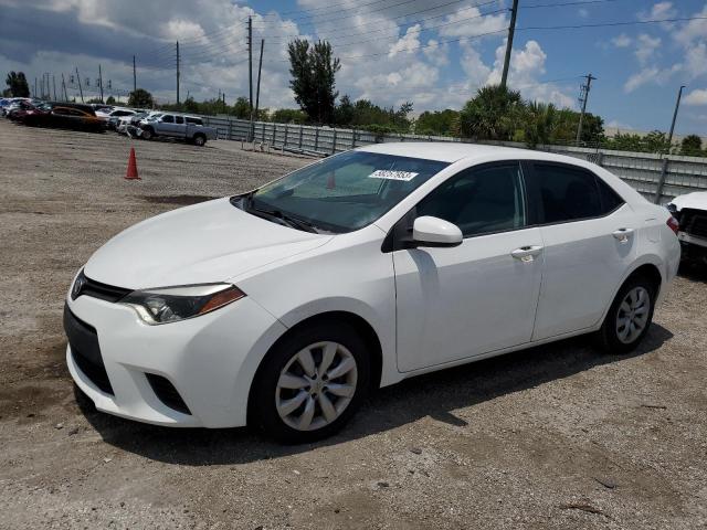 TOYOTA COROLLA L 2014 with VIN 2T1BURHE9EC017104 - Photo from auction