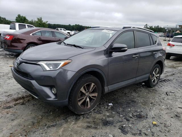 TOYOTA RAV4 XLE 2016 with VIN JTMWFREV8GJ099057 - Photo from auction