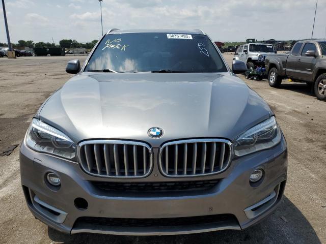 Photo 5 from auction – 2014 BMW X5 XDRIVE5 with VIN 5UXKR6C50E0C02323