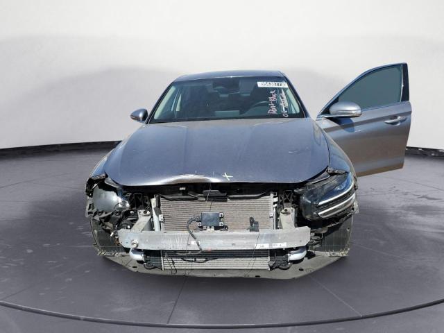 Photo 5 from auction – 2022 GENESIS G70 BASE with VIN KMTG34TA0NU093959