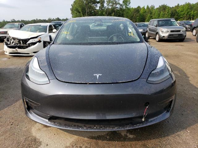 Photo 5 from auction – 2022 TESLA MODEL 3 with VIN 5YJ3E1ECXNF266299