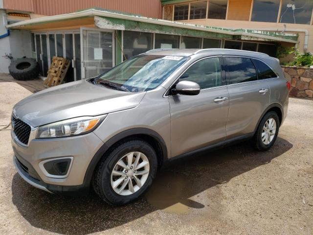 KIA SORENTO LX 2016 with VIN 5XYPG4A30GG024703 - Photo from auction