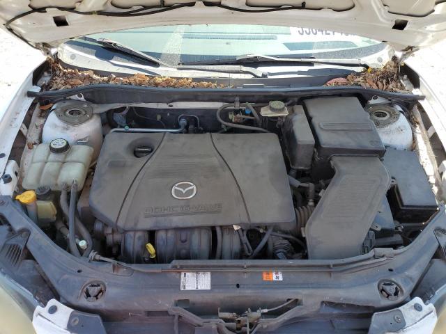 Photo 11 from auction – 2004 MAZDA 3 I with VIN JM1BK12F841175686