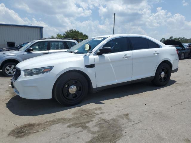 FORD TAURUS POL 2015 with VIN 1FAHP2L86FG148946 - Photo from auction