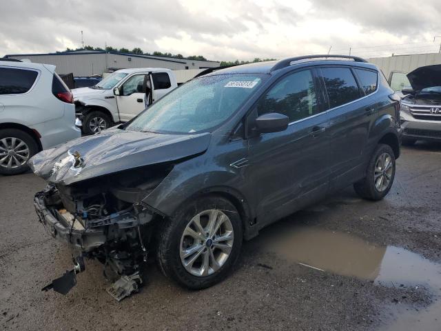 FORD ESCAPE SE 2018 with VIN 1FMCU9GD6JUA51121 - Photo from auction