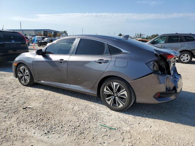 Photo 2 from auction – 2018 HONDA CIVIC EX with VIN JHMFC1F32JX042802