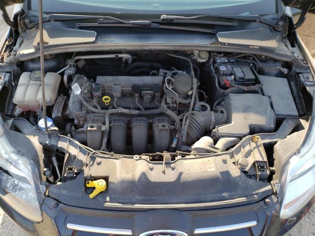 Photo 11 from auction – 2014 FORD FOCUS SE with VIN 1FADP3F22EL229007
