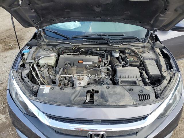 Photo 11 from auction – 2018 HONDA CIVIC LX with VIN 19XFC2F53JE208947