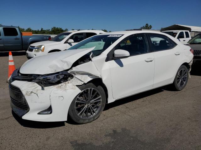 TOYOTA COROLLA L 2017 with VIN 5YFBURHE5HP589209 - Photo from auction