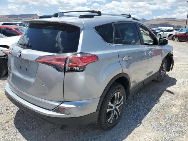 Photo 3 from auction – 2018 TOYOTA RAV4 LE with VIN 2T3ZFREV5JW417254