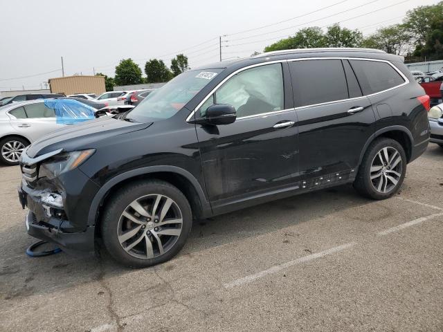 HONDA PILOT TOUR 2017 with VIN 5FNYF6H99HB089278 - Photo from auction
