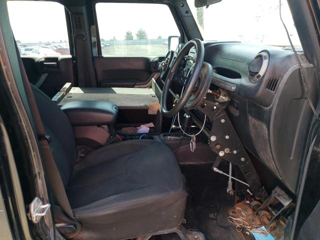Photo 7 from auction – 2015 JEEP WRANGLER U with VIN 1C4BJWDG5FL736861