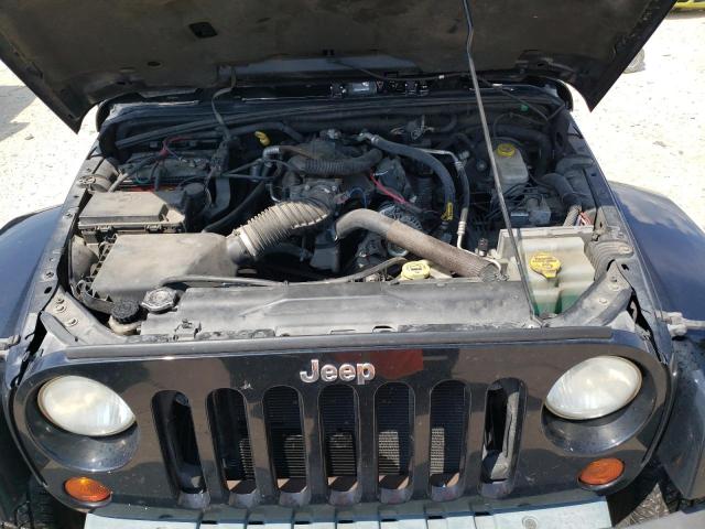 Photo 11 from auction – 2010 JEEP WRANGLER U with VIN 1J4BA5H15AL118085