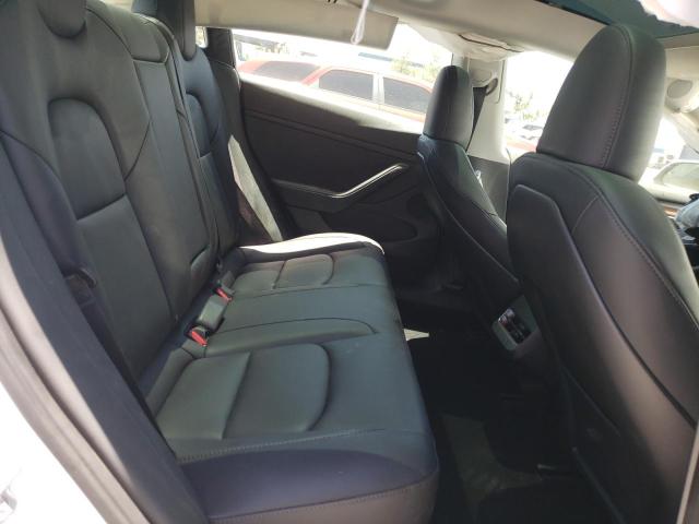 Photo 10 from auction – 2023 TESLA MODEL 3 with VIN 5YJ3E1EAXPF506789